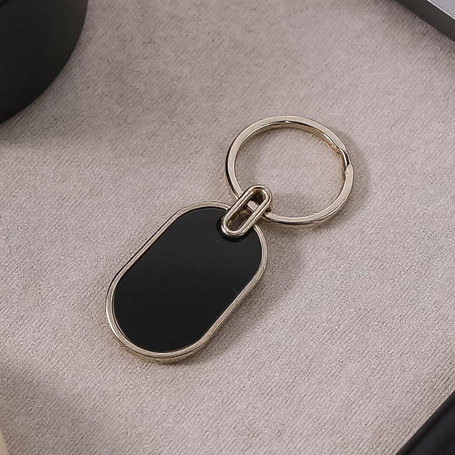 Oval Metal Keychain – Elegant Black & Silver Finish for Everyday Use